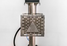 Mechanism For Heat Sealing Capsules
